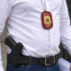 OFICIAL DE JUSTIÇA COM PORTE DE ARMA
